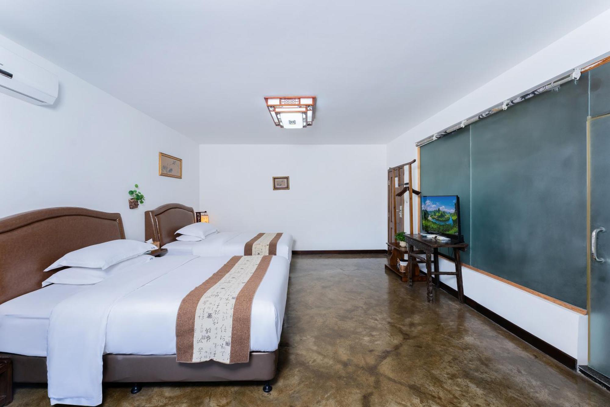 Leisure Courtyard Hotel Yangshuo-Free Shuttle Bus To Yangshuo Station Stay 2 Nights One Way Экстерьер фото